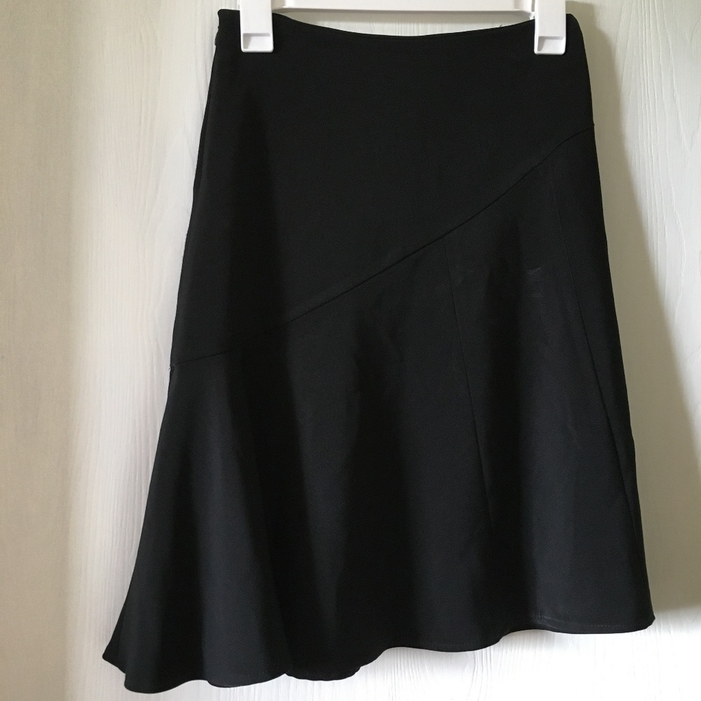 White House Black Market black flare skirt. Size 2.
